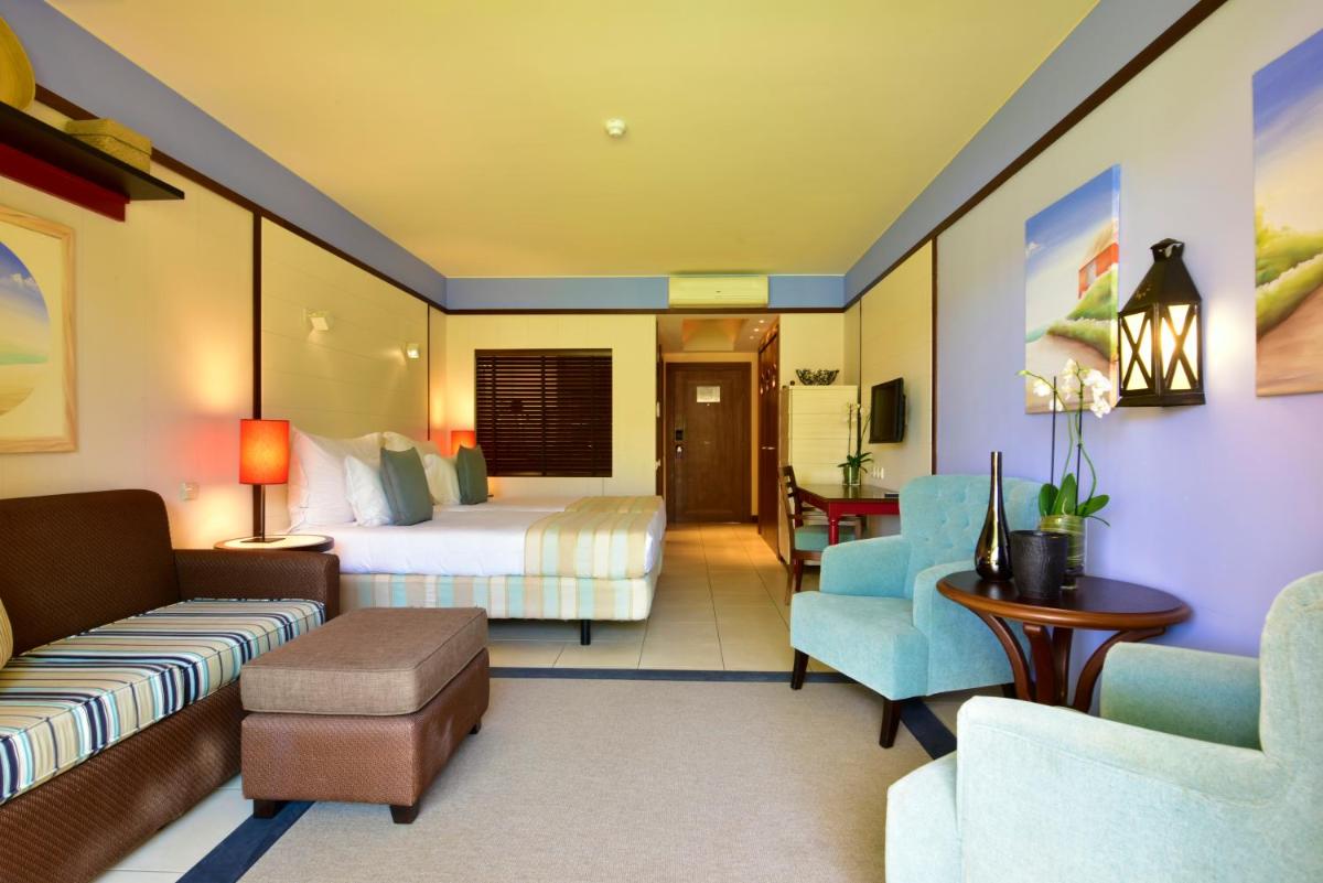 Uma área de estar em Pestana Porto Santo Premium All Inclusive Beach & SPA Resort
