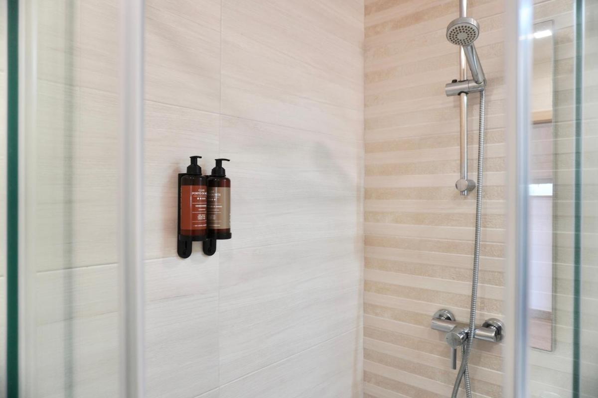 Uma casa de banho em Clube Porto Mos - Sunplace Hotels & Beach Resort