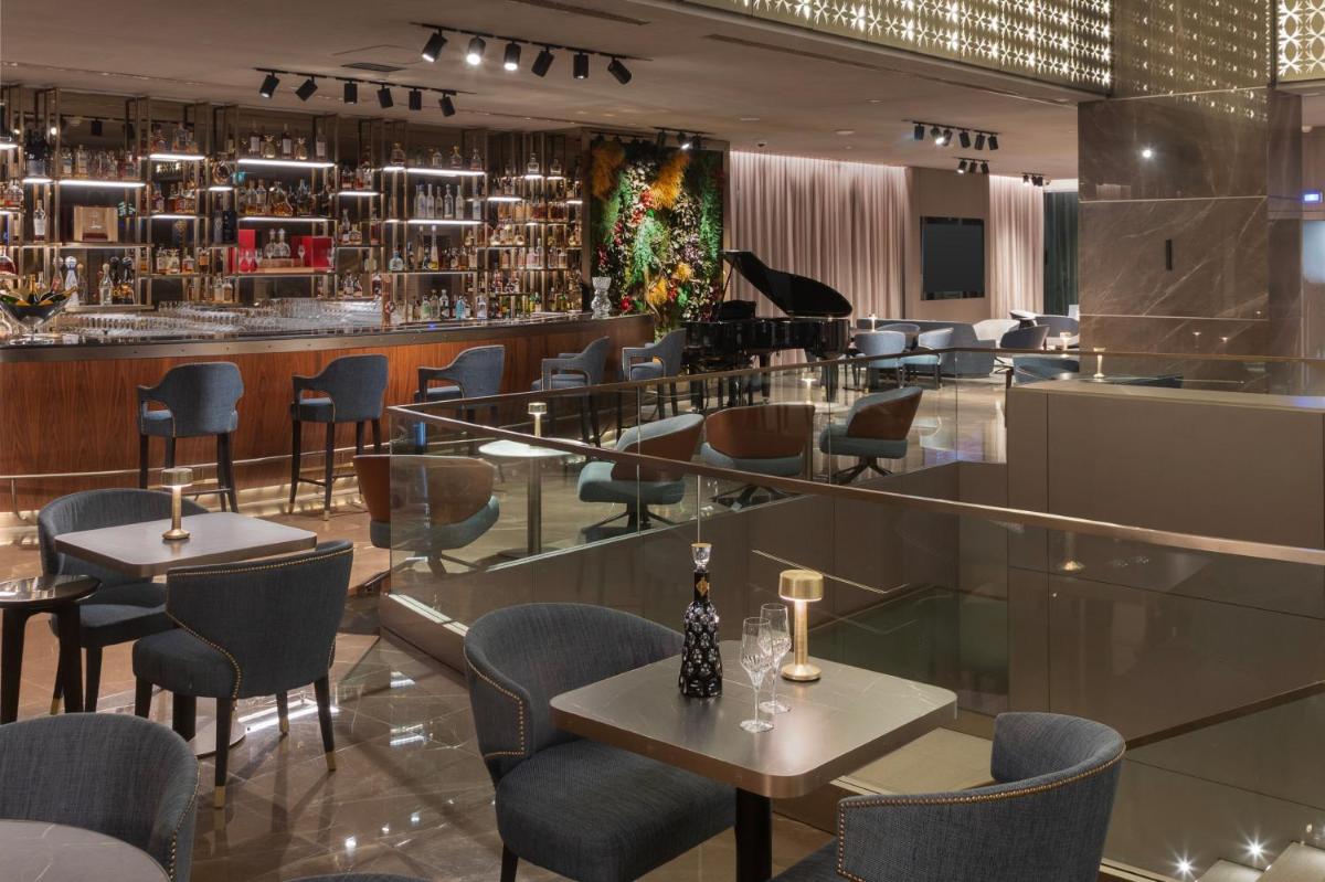 A área de bar ou lounge em EPIC SANA Marquês Hotel
