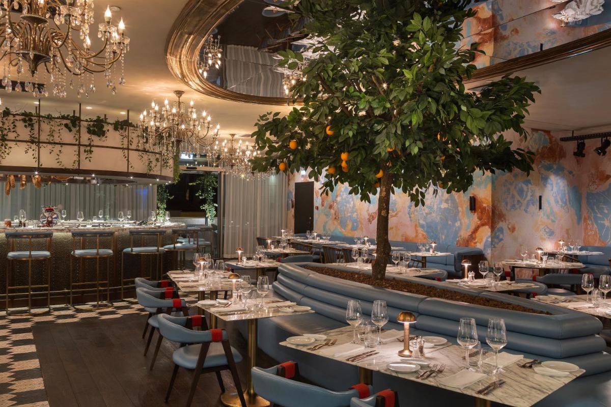 Um restaurante ou outro lugar para comer em EPIC SANA Marquês Hotel