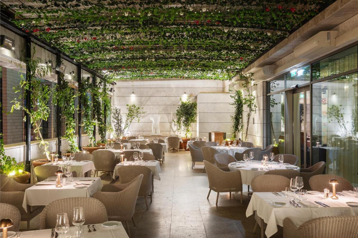 Um restaurante ou outro lugar para comer em EPIC SANA Marquês Hotel