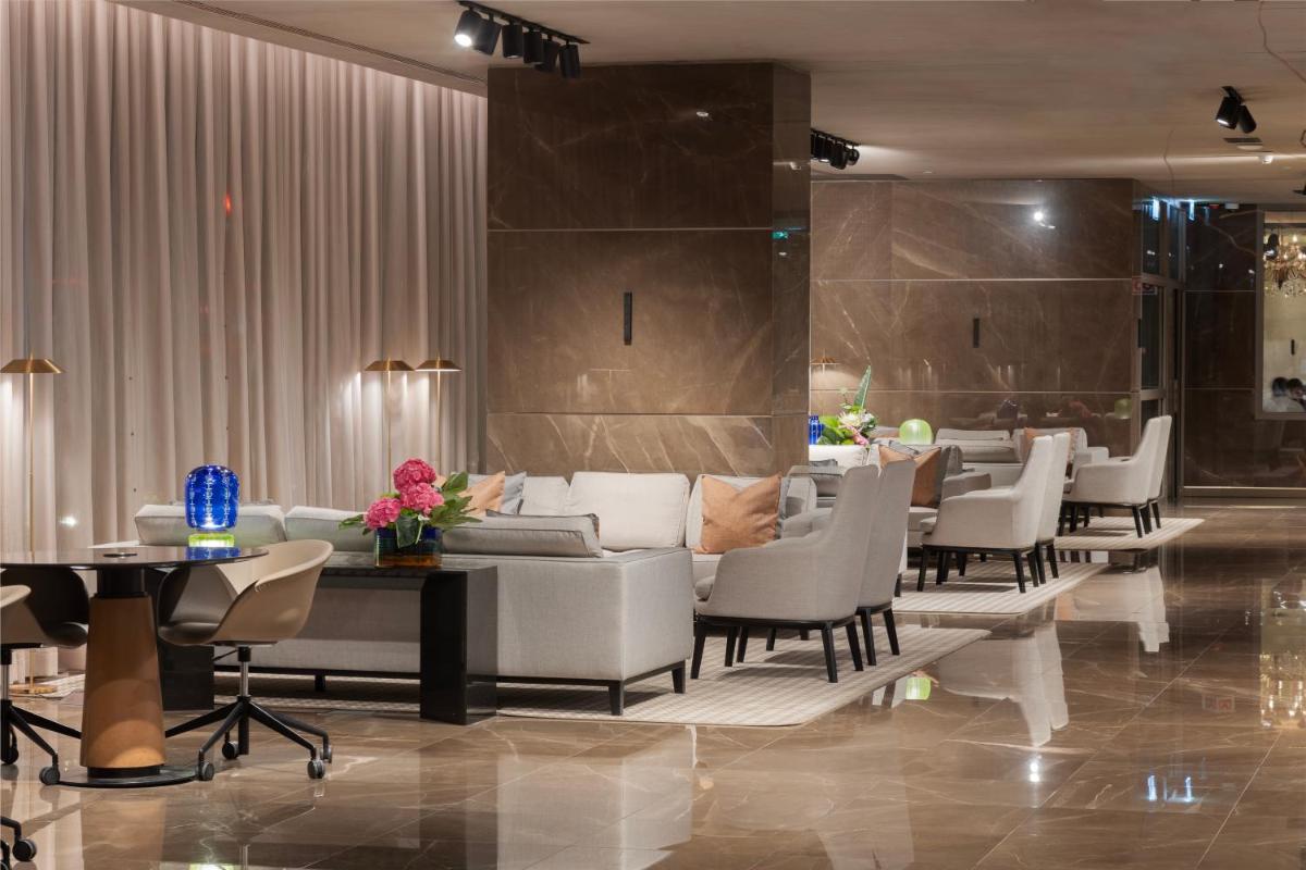 Uma área de estar em EPIC SANA Marquês Hotel