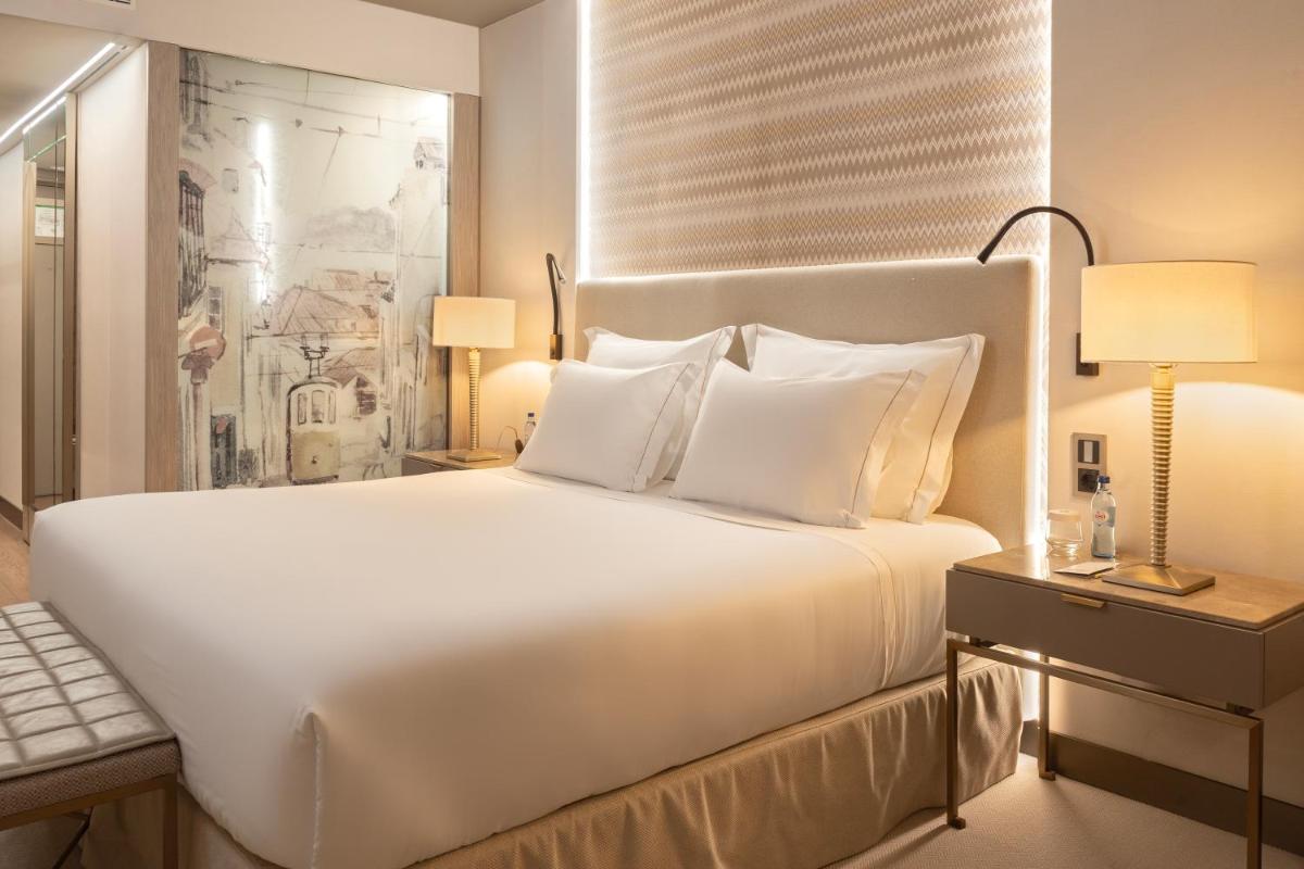 Uma cama ou camas num quarto em EPIC SANA Marquês Hotel