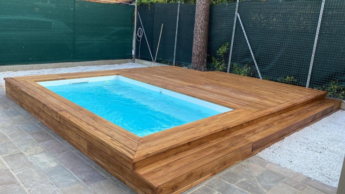 MIMA61 - Appartamento con piscina, giardino e posti auto a 50mt dal centro - Housity