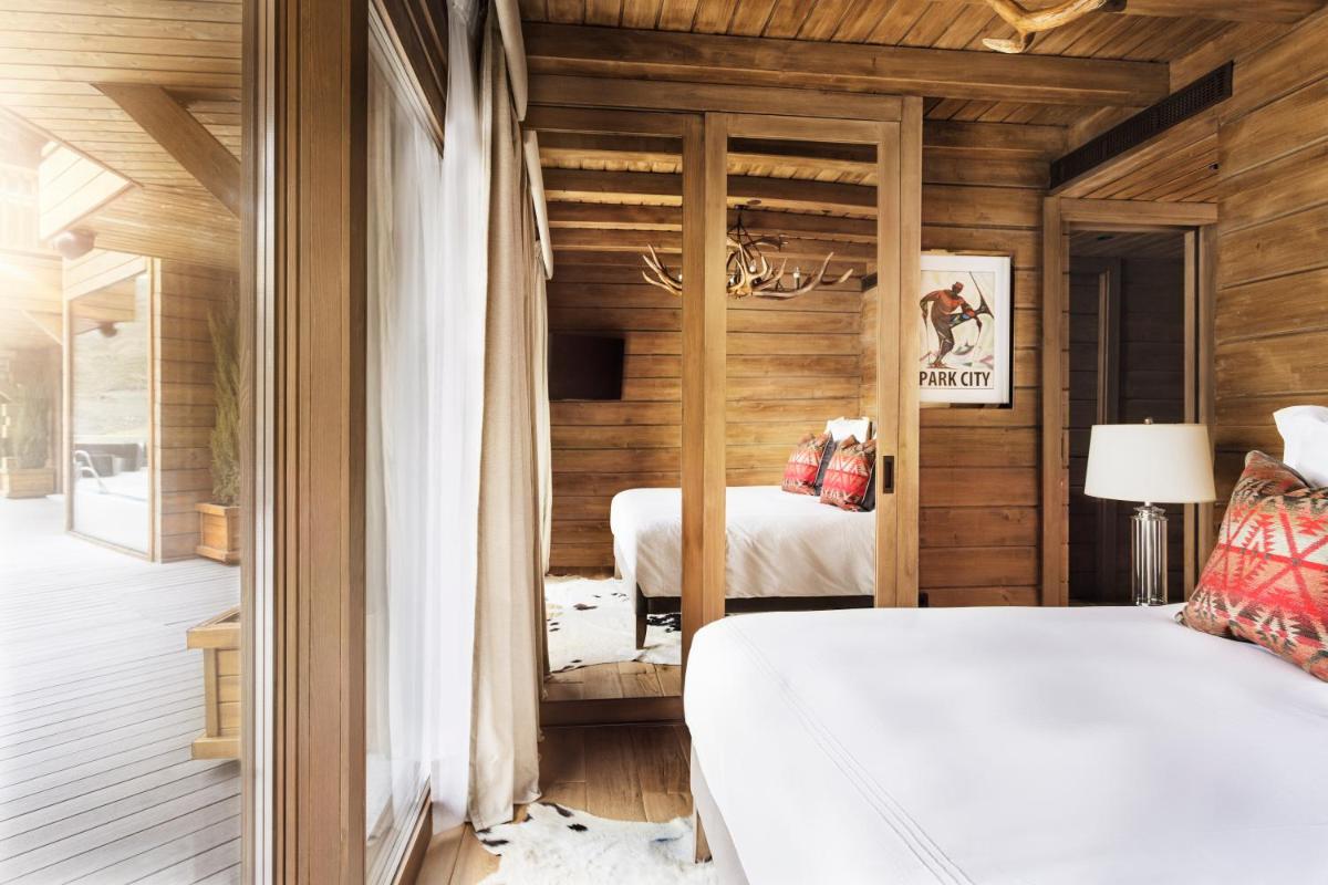 Cama o camas de una habitación en El Lodge, Ski & Spa