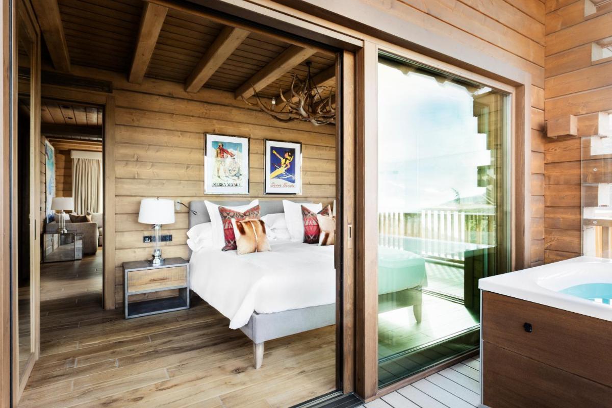 Cama o camas de una habitación en El Lodge, Ski & Spa