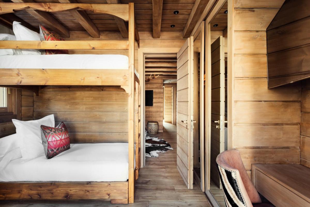 Cama o camas de una habitación en El Lodge, Ski & Spa