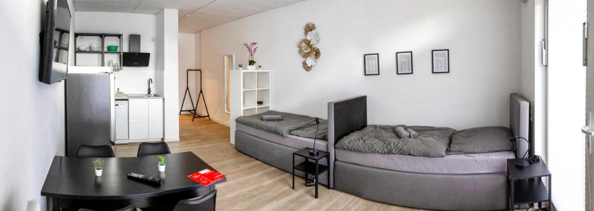 Apartment mit vier Einzelboxspringbetten - Netflix - Housity