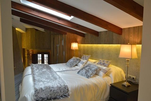 Cama o camas de una habitación en Hotel Las Treixas