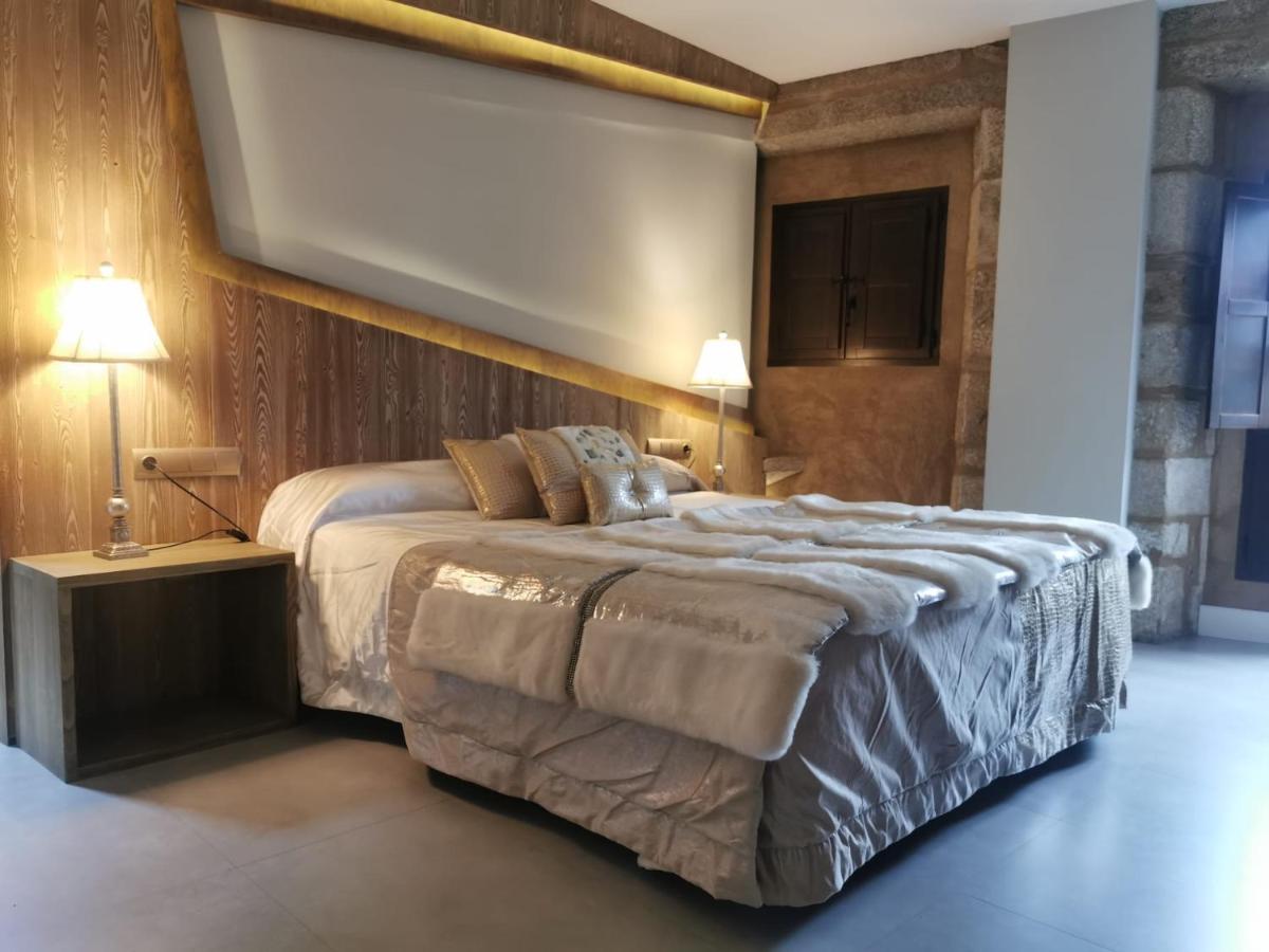 Cama o camas de una habitación en Hotel Las Treixas