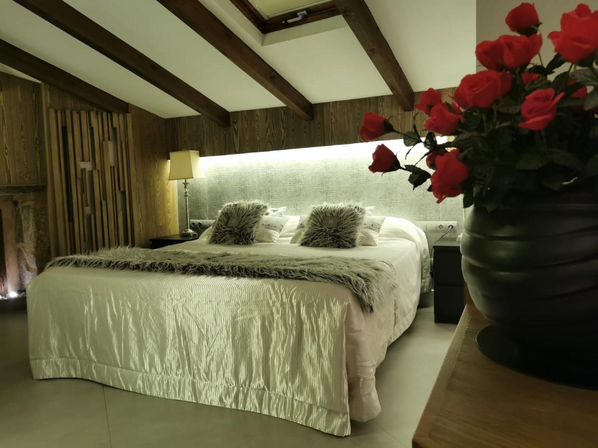 Cama o camas de una habitación en Hotel Las Treixas