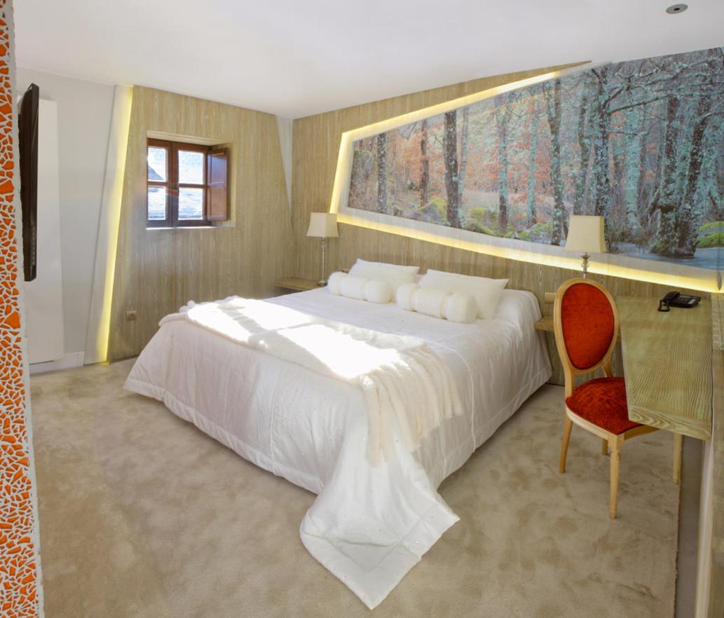 Cama o camas de una habitación en Hotel Las Treixas