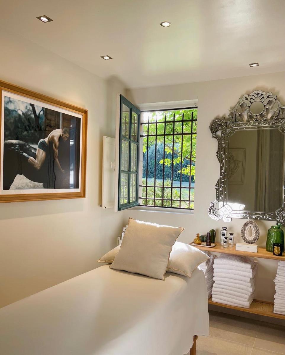 Un ou plusieurs lits dans un hébergement de l'établissement Beaumanoir Small Luxury Boutique Hotel