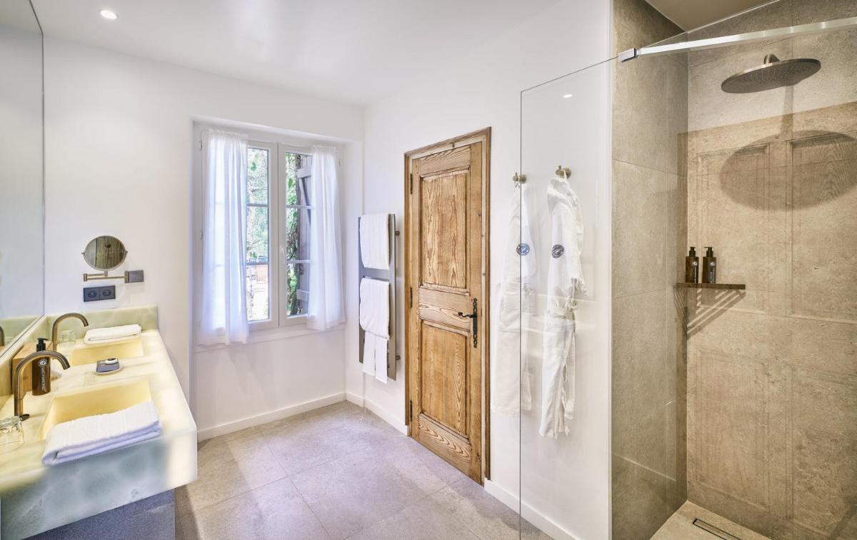 Salle de bains dans l'établissement La Ferme D'Augustin