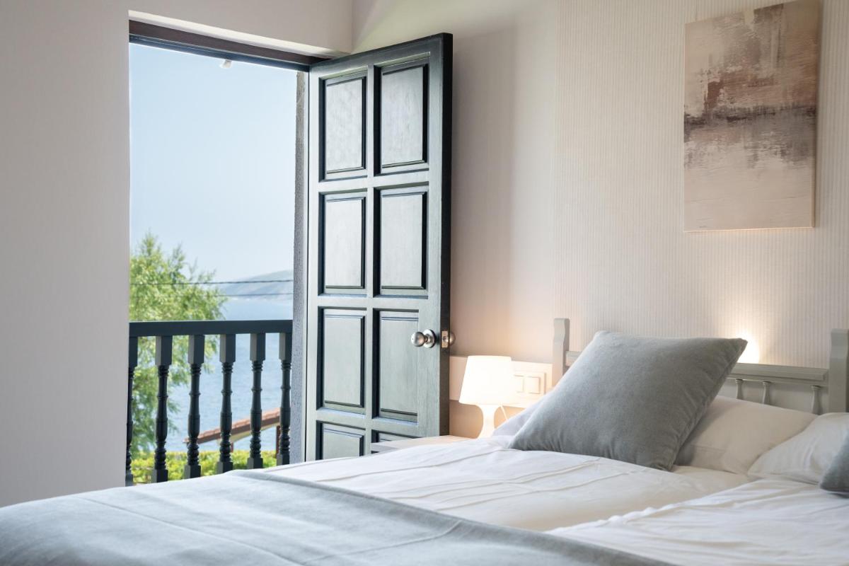 Apartamentos Turísticos El Puerto de Comillas - Housity