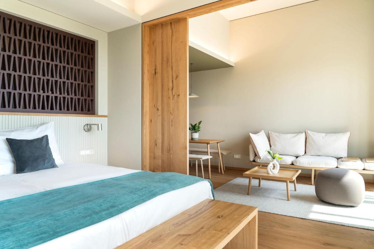 Ein Bett oder Betten in einem Zimmer der Unterkunft WALDWEIT Rheingau Hotel und Retreat