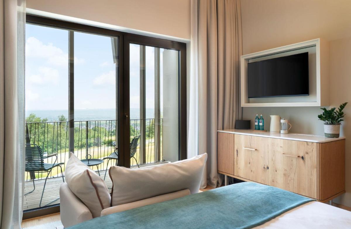 TV/Unterhaltungsangebot in der Unterkunft WALDWEIT Rheingau Hotel und Retreat