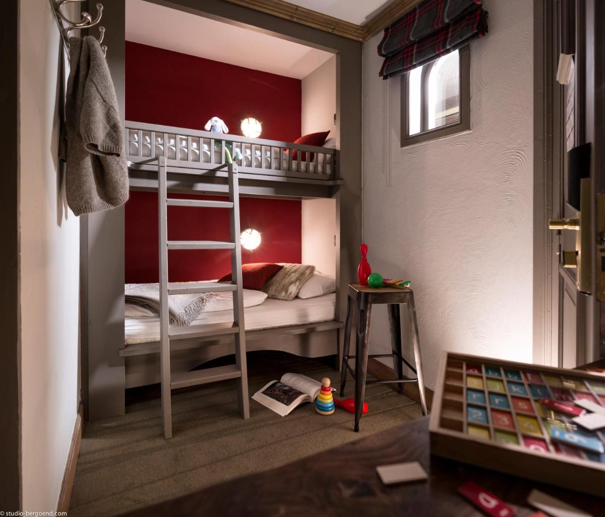 Un ou plusieurs lits dans un hébergement de l'établissement Hôtel Village Montana by Les Etincelles