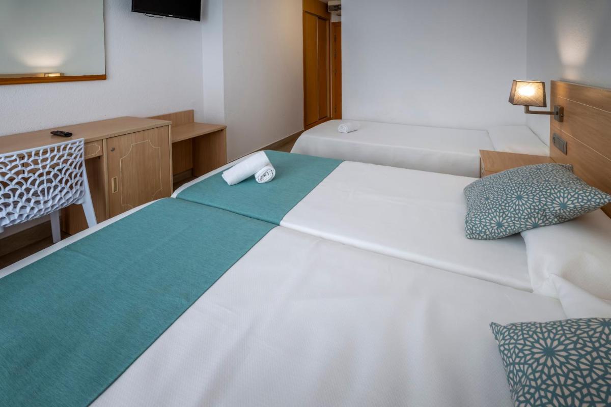 Cama o camas de una habitación en 4R Salou Park Resort II