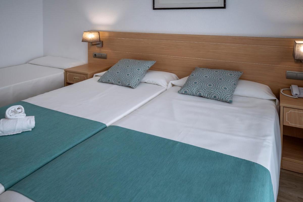 Cama o camas de una habitación en 4R Salou Park Resort II