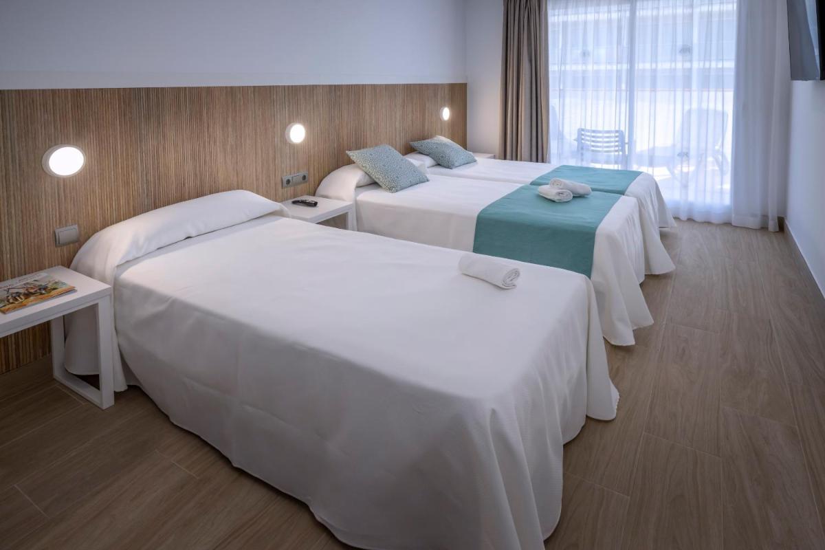 Cama o camas de una habitación en 4R Salou Park Resort II