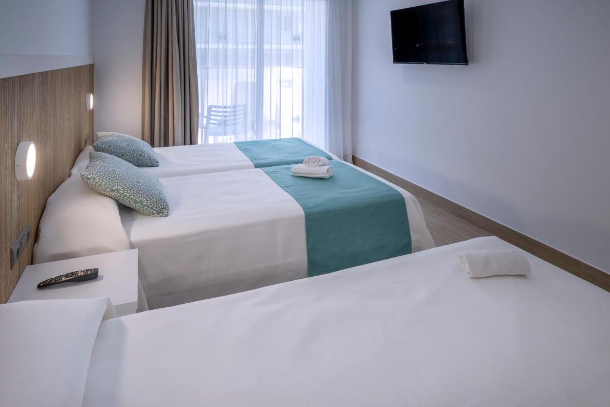Cama o camas de una habitación en 4R Salou Park Resort II