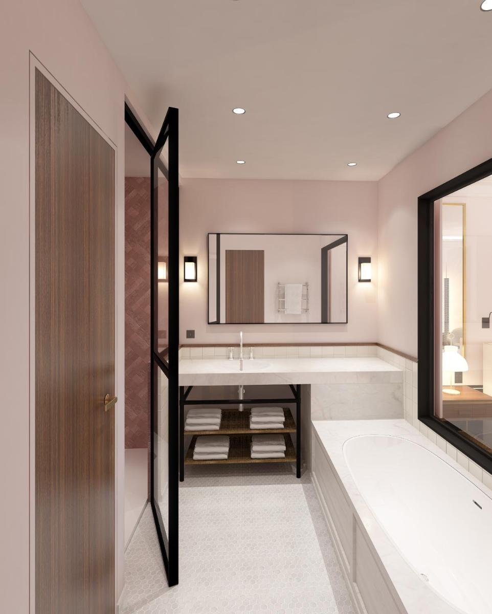 Un ou plusieurs lits dans un hébergement de l'établissement Le Roch Hotel & Spa