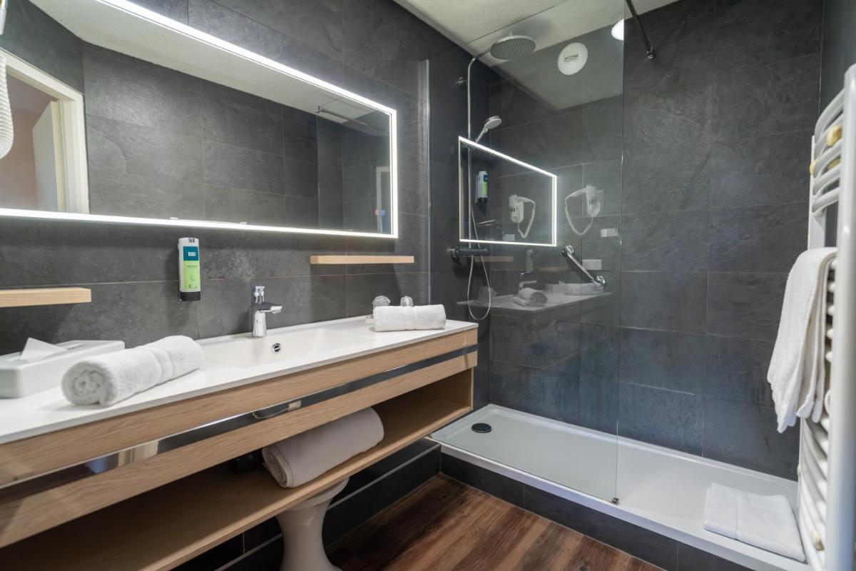 Logis Hotel Arc En Ciel - Housity