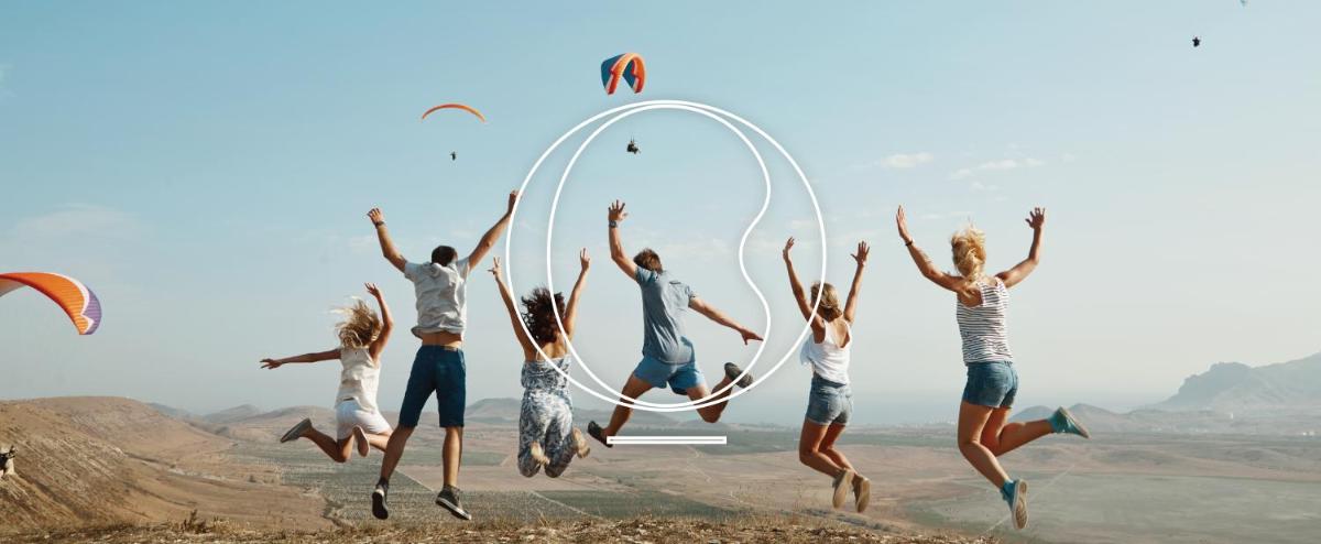 a group of people jumping in the air at Miros - Formerly Imperial Goa in Old Goa