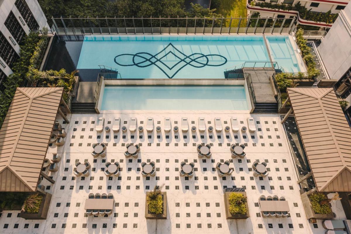 an overhead view of a building with a swimming pool at Fairmont Mumbai in Mumbai
