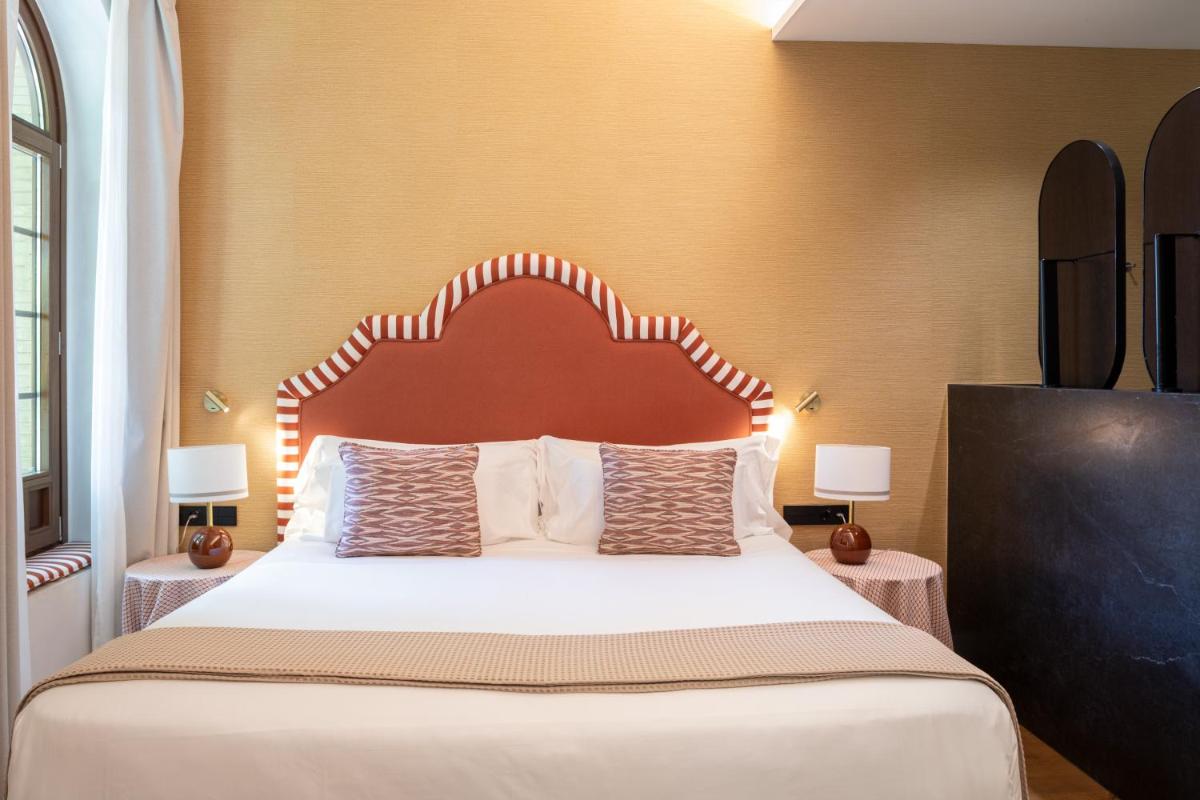Cama o camas de una habitación en Cavalta Boutique Hotel - Small Luxury Hotels
