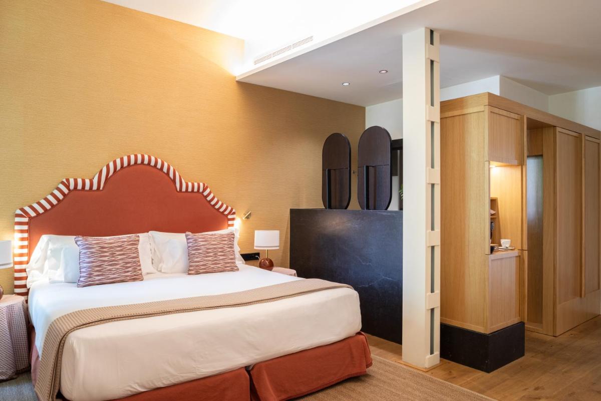 Cama o camas de una habitación en Cavalta Boutique Hotel - Small Luxury Hotels