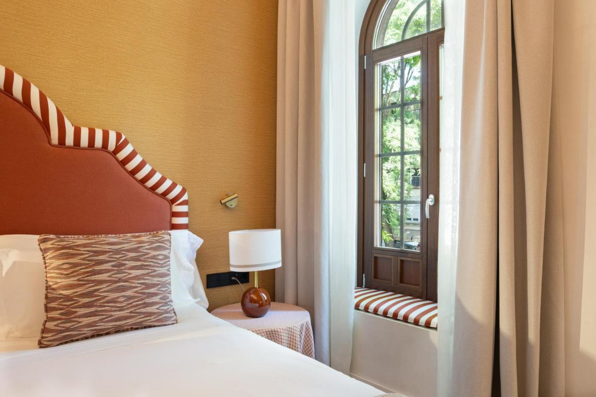 Cama o camas de una habitación en Cavalta Boutique Hotel - Small Luxury Hotels