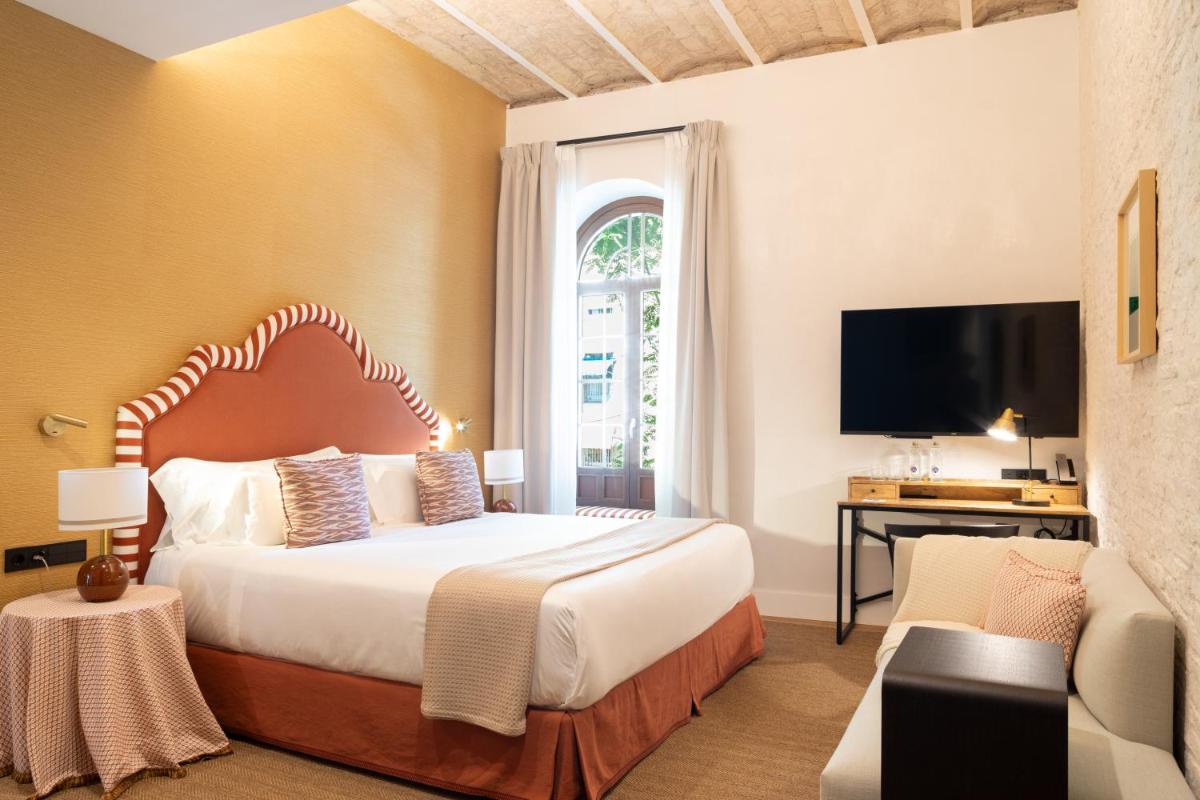 Cama o camas de una habitación en Cavalta Boutique Hotel - Small Luxury Hotels