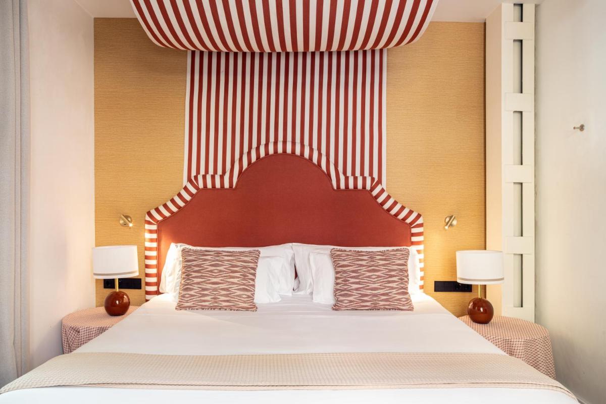 Cama o camas de una habitación en Cavalta Boutique Hotel - Small Luxury Hotels