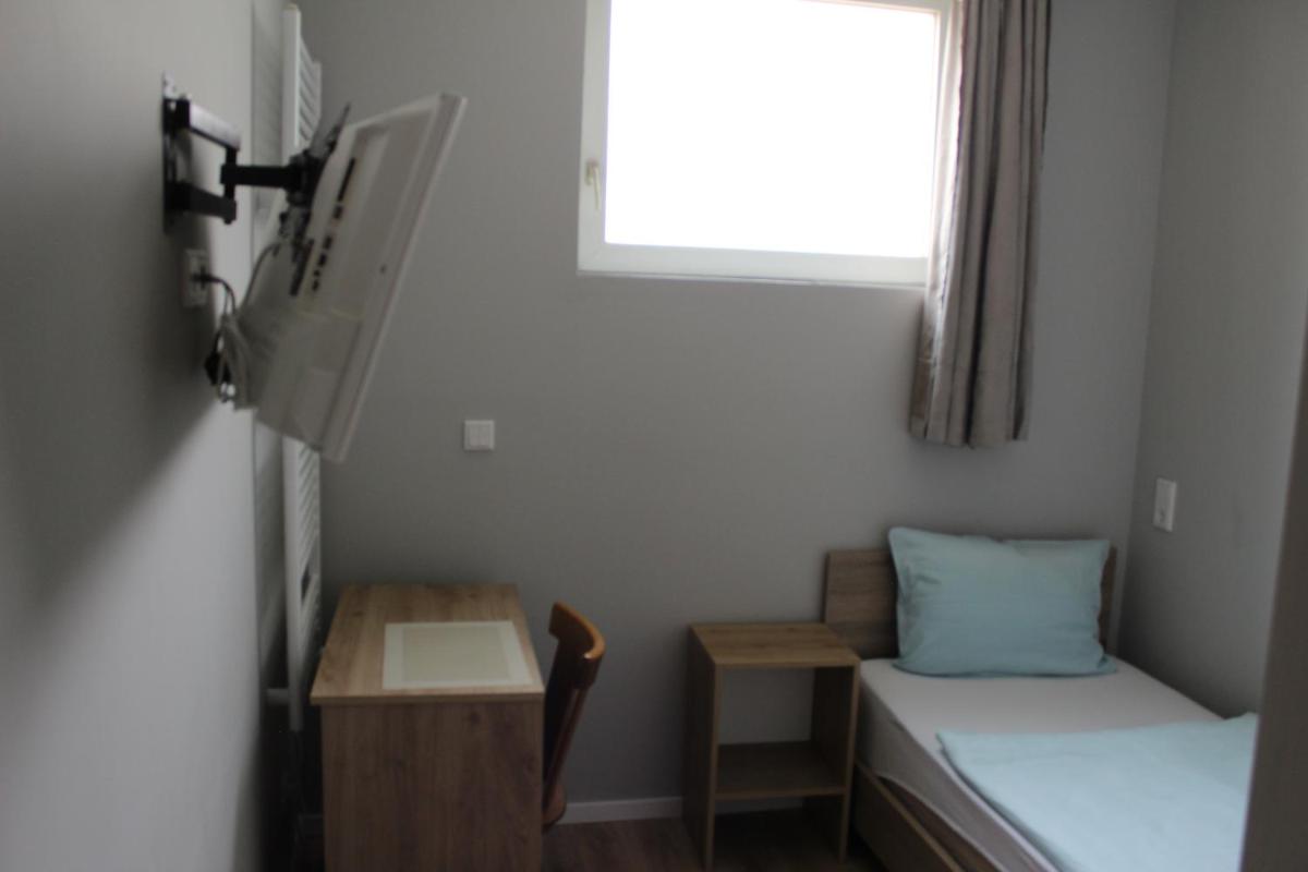 Hotel Garni Postkutsche - Housity