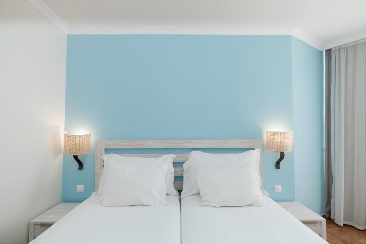 Uma cama ou camas num quarto em Pestana Viking Beach & SPA Resort