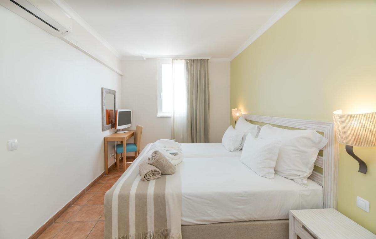 Uma cama ou camas num quarto em Pestana Viking Beach & SPA Resort