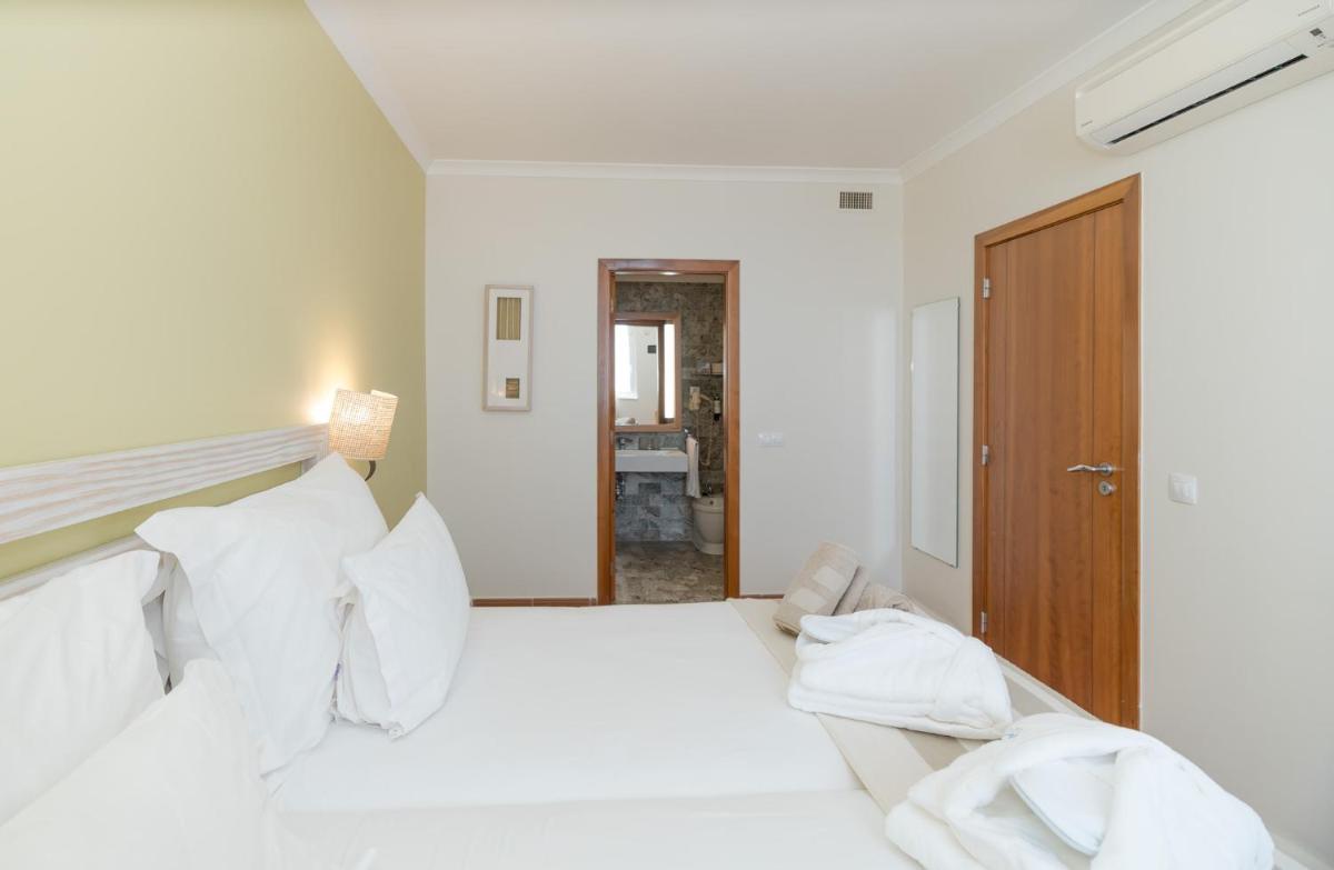 Uma cama ou camas num quarto em Pestana Viking Beach & SPA Resort
