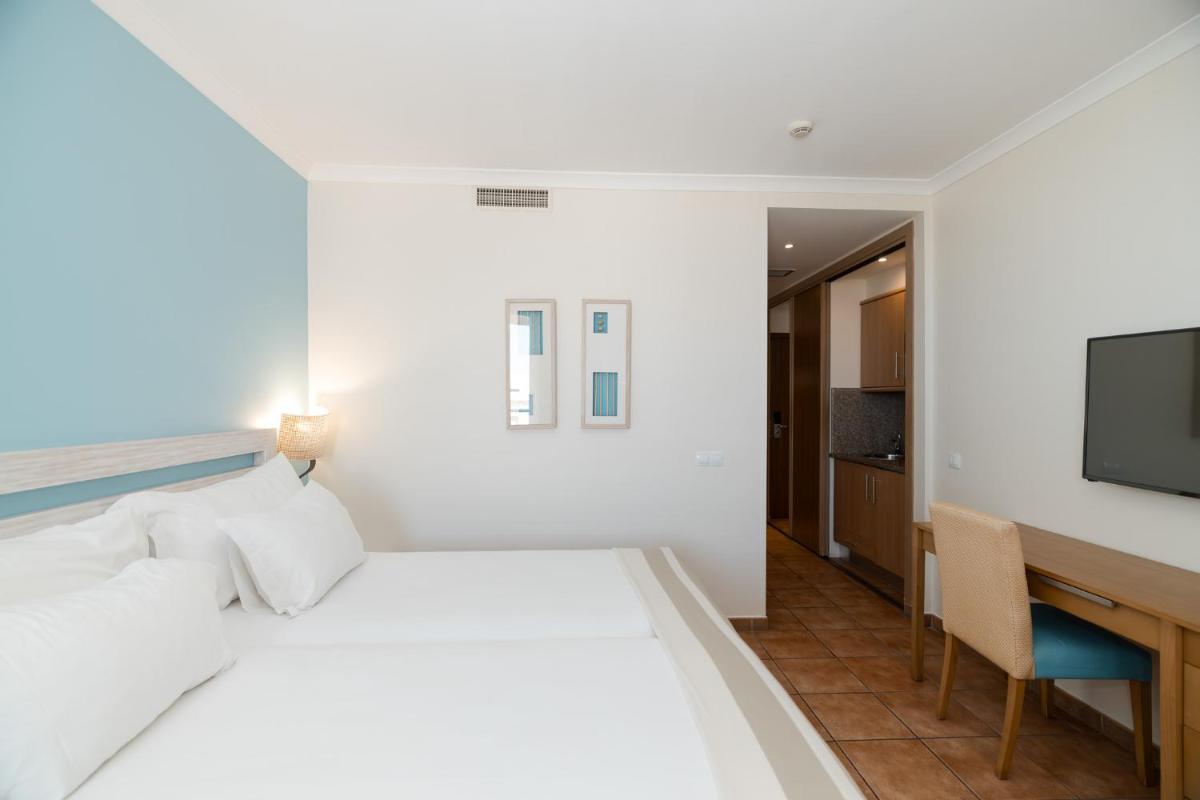 Uma cama ou camas num quarto em Pestana Viking Beach & SPA Resort