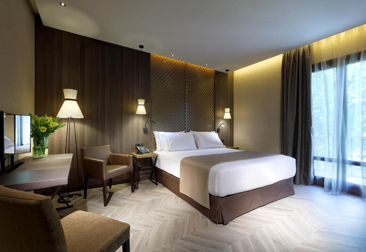 Cama o camas de una habitación en Áurea Washington Irving by Eurostars Hotel Company