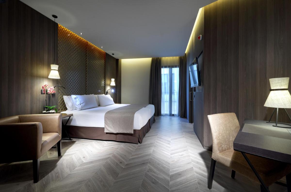 Cama o camas de una habitación en Áurea Washington Irving by Eurostars Hotel Company