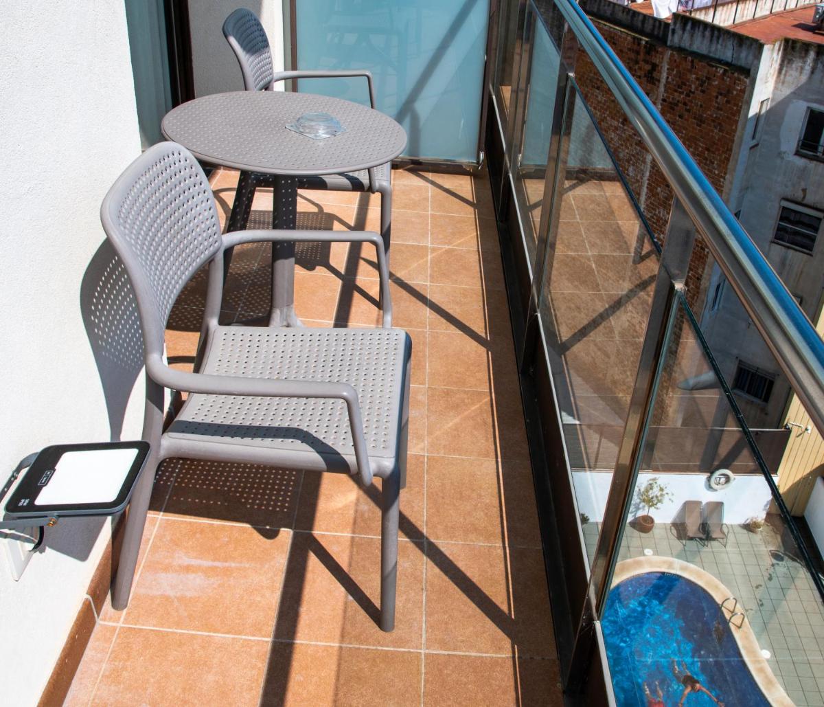 Un balcón o terraza de Petit Palau - Adults Only