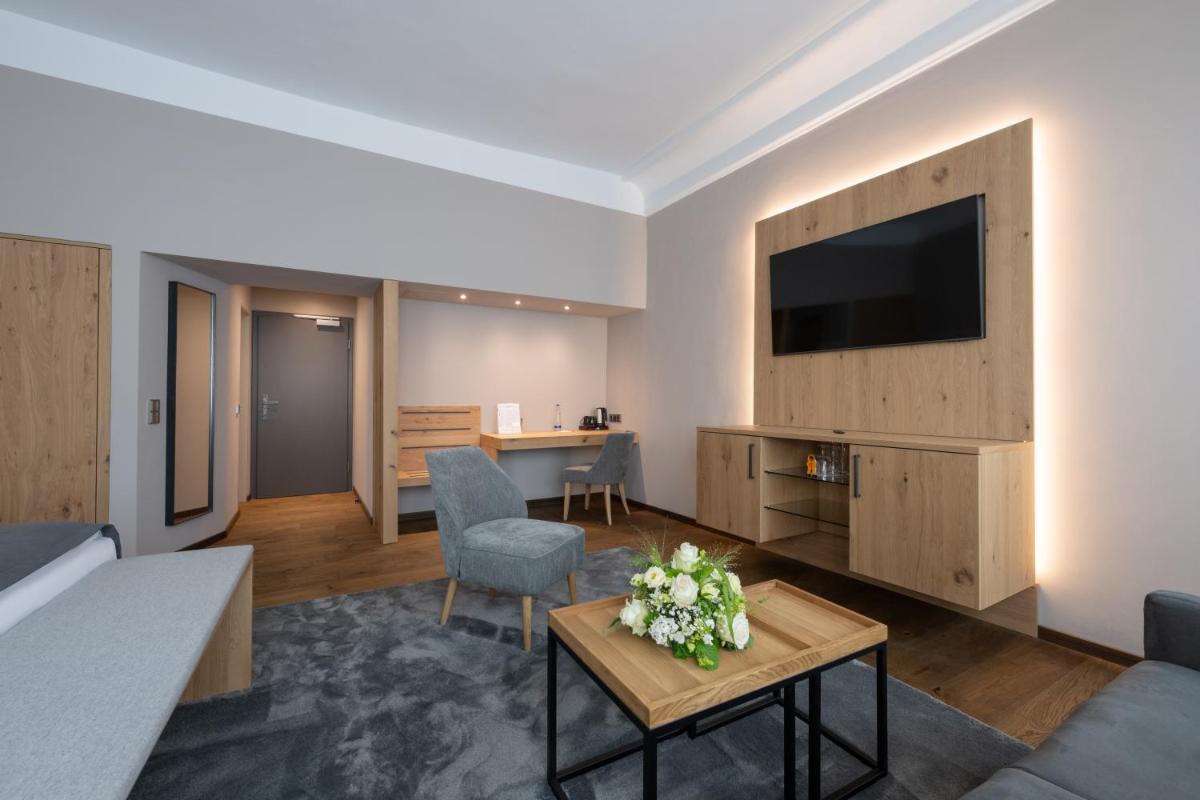 Hotel Goldene Sonne - Housity