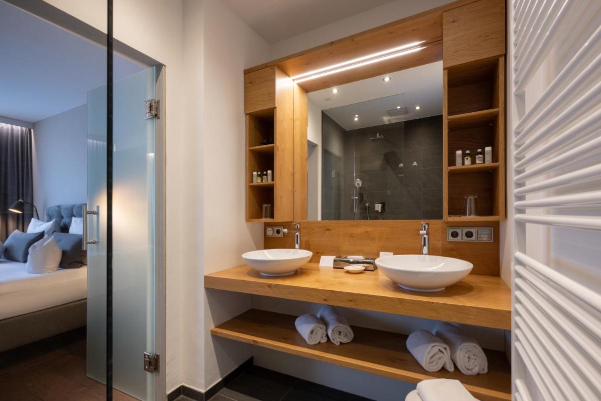 Hotel Goldene Sonne - Housity