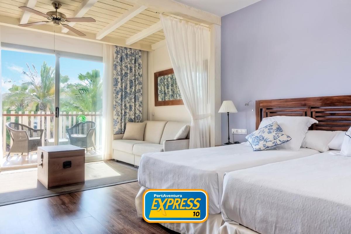 Cama o camas de una habitación en PortAventura Hotel Caribe - Includes unlimited access to PortAventura Park & 1 access to Ferrari Land