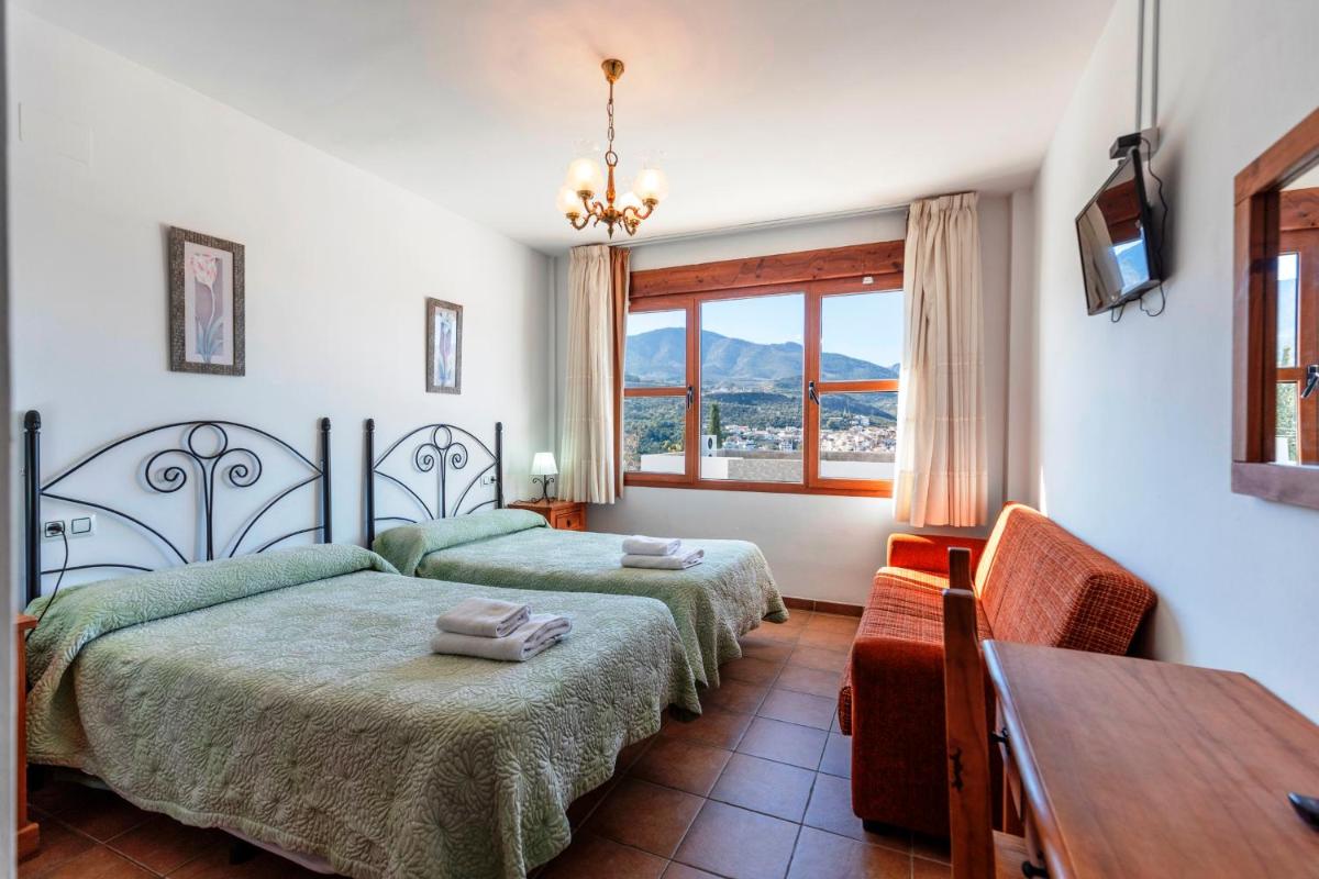 Hostal y Apartamento Rural Los Naranjos - Housity