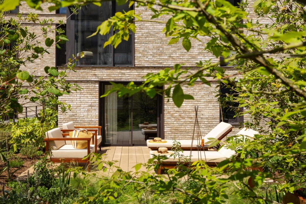 Jardin de l'établissement Belinda Hôtel & Spa