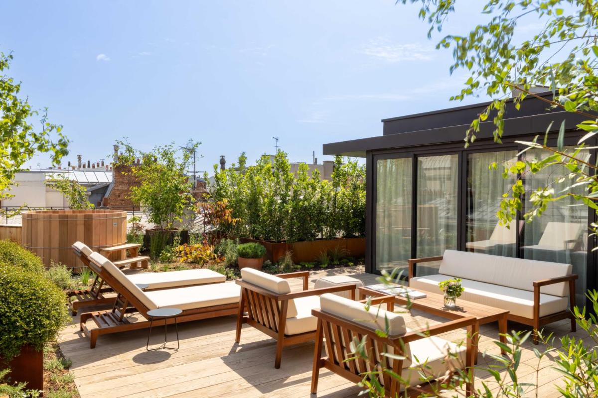 Jardin de l'établissement Belinda Hôtel & Spa