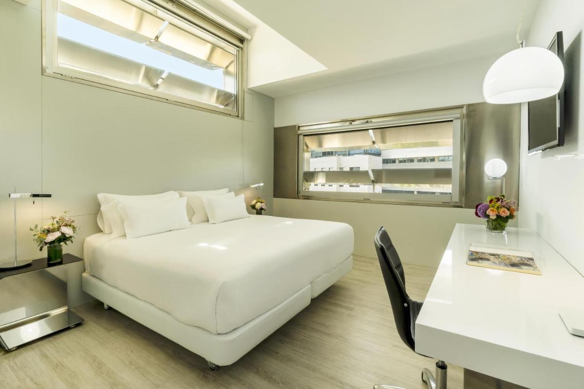 Cama o camas de una habitación en NH Collection Barcelona Constanza